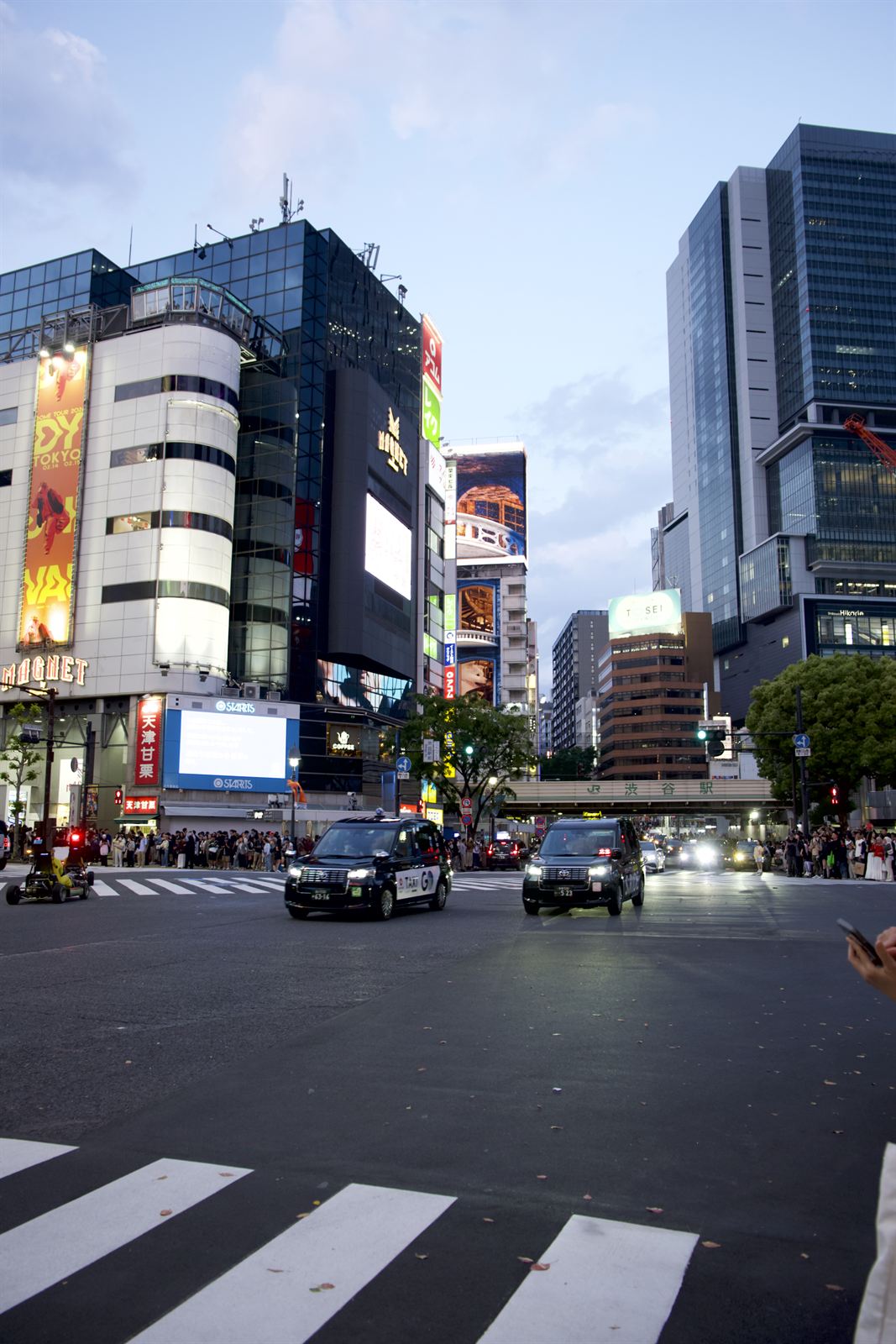 Taxis near Shibuya Station at dusk, Tokyo