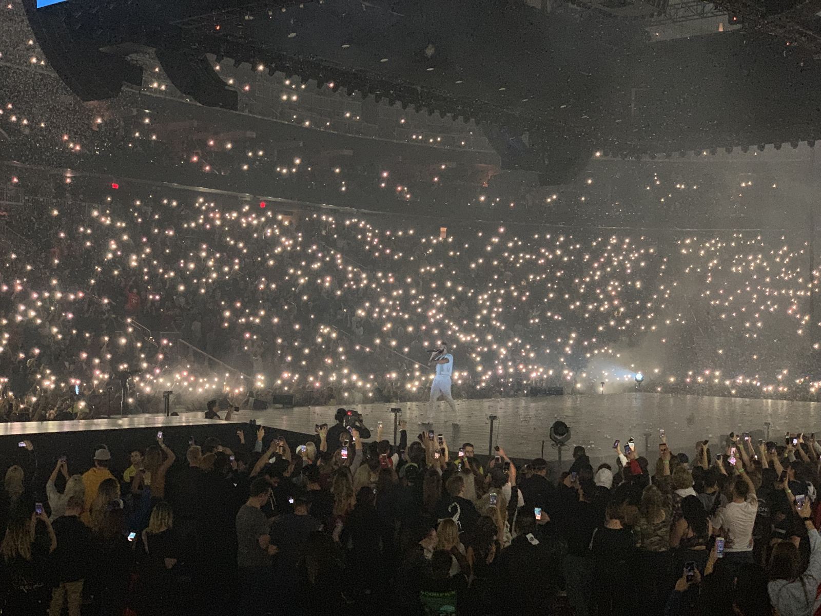 Concert crowd holding up phone lights, Vancouver