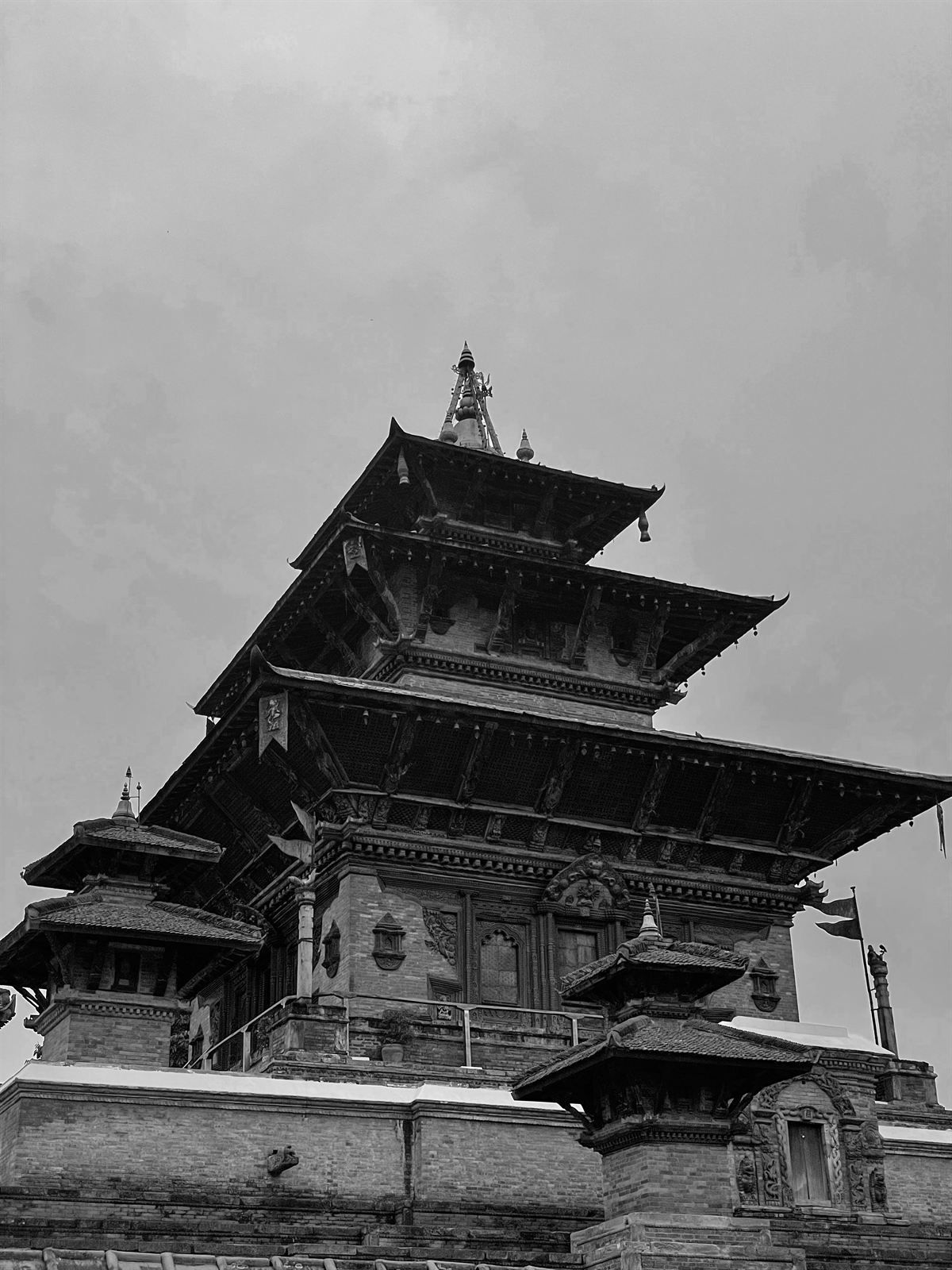 Tiered temple against a grey sky, Durbar Square, Kathmandu